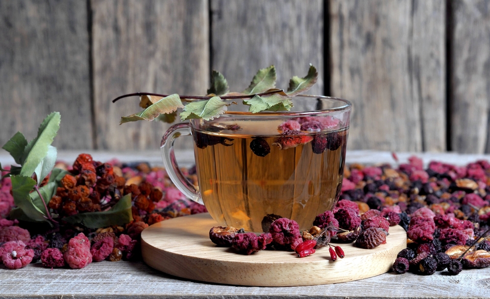 A cup of fortified fruit tea with dried berries