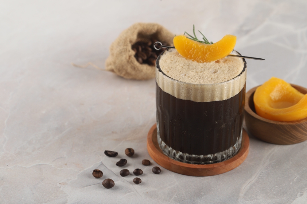 Cold brew coffee with lemon, peach and honey 