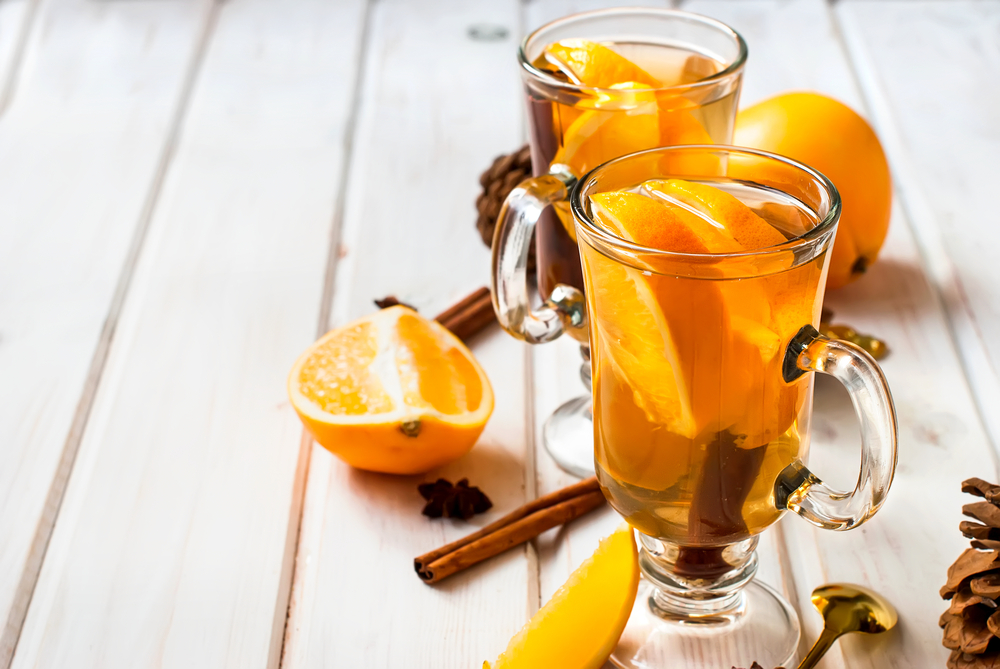 Orange flavored beverage with cinnamon and cardamom 