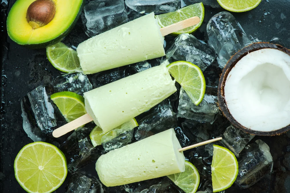 Avocadolime and coconut healthy trendy popsicles. shutterstock 1036777081