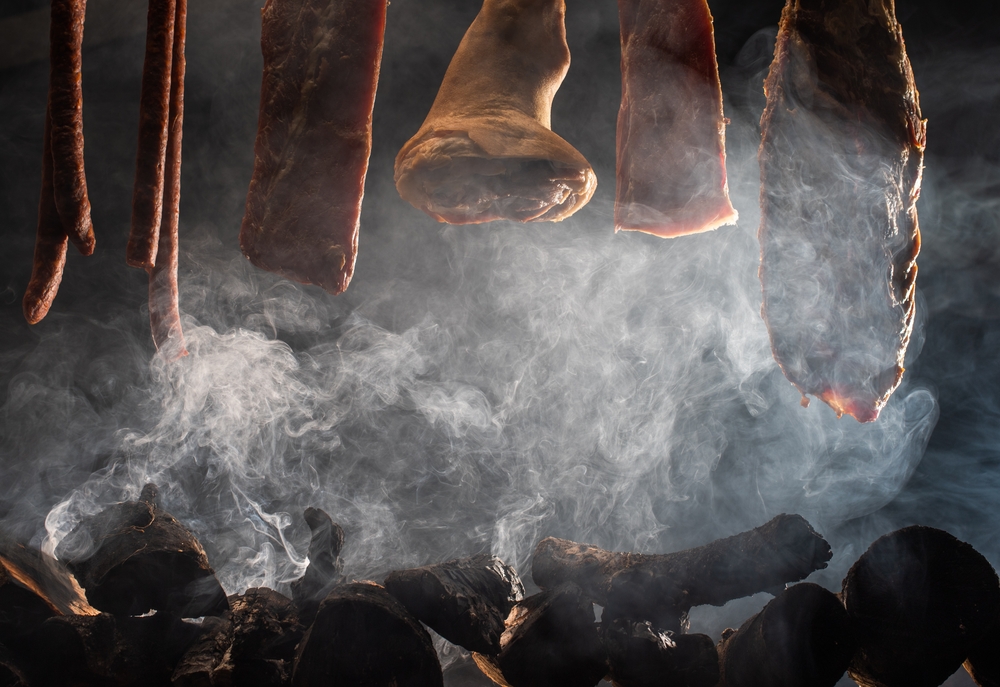 Drying meat in smokehouse