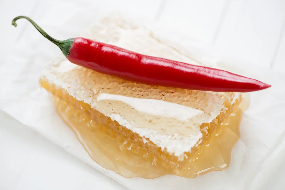Honeycomb and red chili pepper shutterstock 163227851