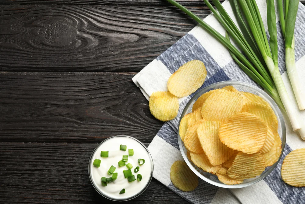Potato Chips sour cream and chives flavor shutterstock 1421010983